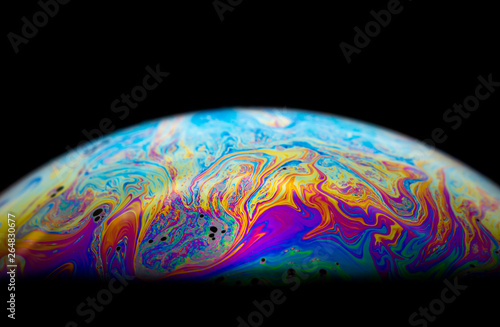 Light refraction from the surface of a soap bubble