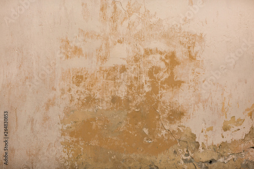 Urban grunge background of old beige wall. Texture