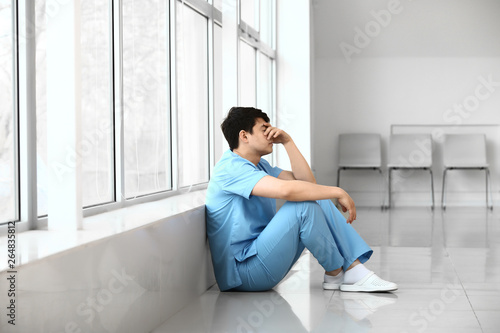 Depressed male medical assi...