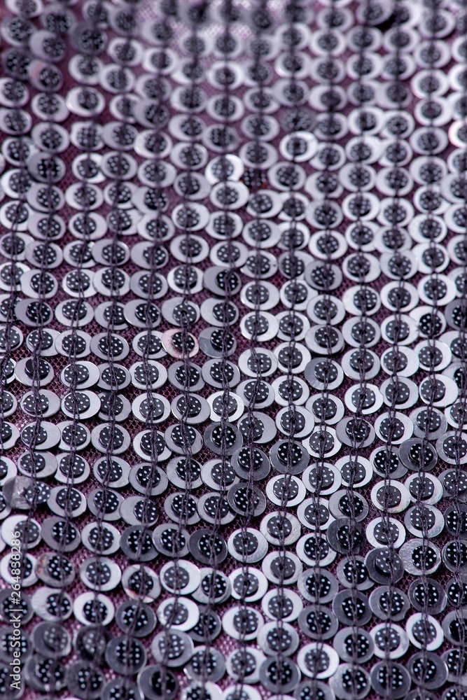 Fabric with sequins and sequins of bright colors. Fashion glitter fabric, sequins. Shiny surface Fabric with sequins and sequins of bright colors. Fashion glitter fabric, sequins. Shiny surface