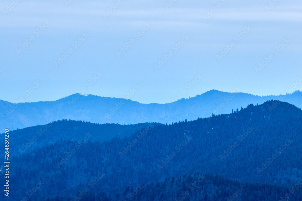 winter landscapes of Ukrainian and Romanian Carpathians ,Snow Mountain with Blue Sky
