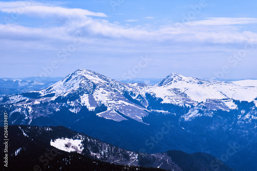 winter landscapes of Ukrainian and Romanian Carpathians ,Snow Mountain with Blue Sky © Mykhailo