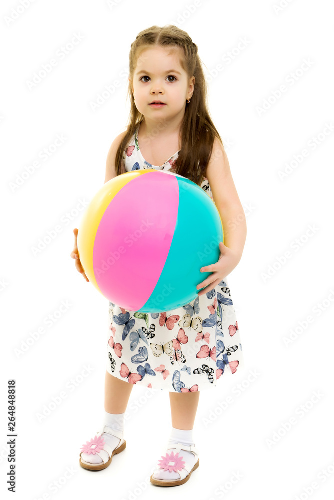 Little girl is playing with a ball Little girl is playing with a ball