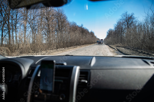 riding by bad road. destroyed highway