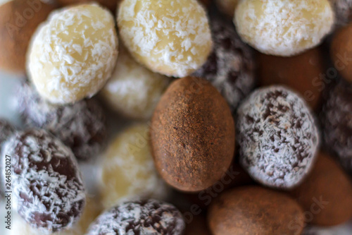 White, dark and cocoa chocolate almond eggs