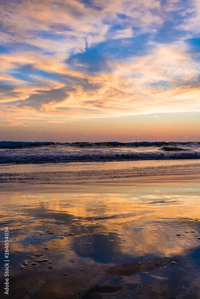 Beautiful sunset scenery on the beach of Montanita Ecuador