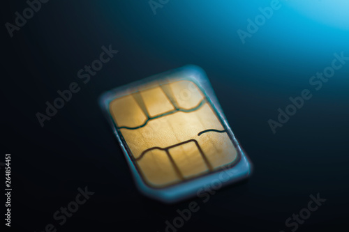 Sim card close up on black photo