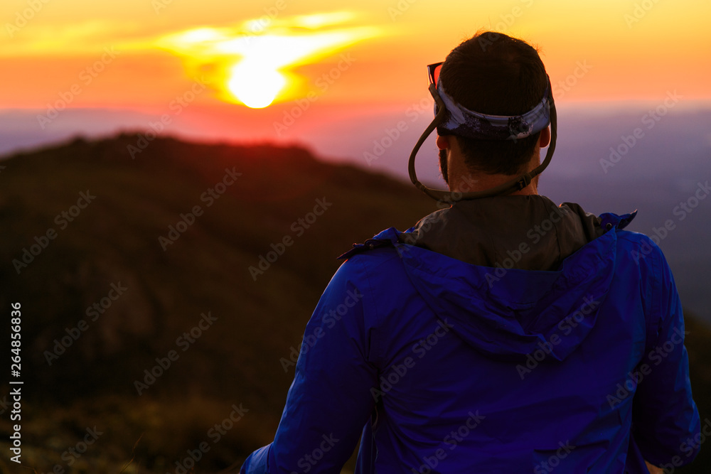 Man watching sunset Man watching sunset