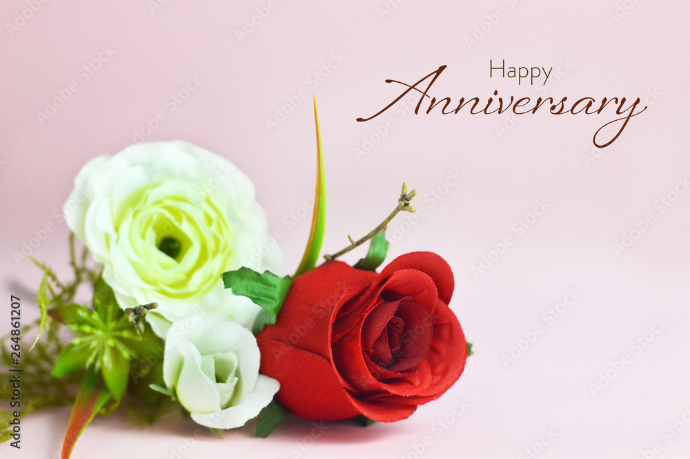 Happy Anniversary card. Artificial flowers on pink background