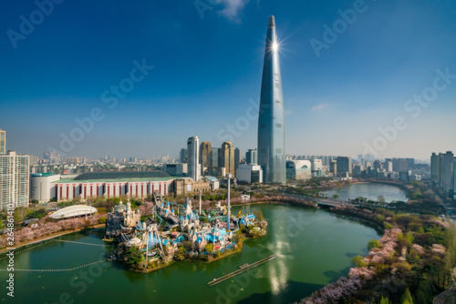 Cityscape of Seoul downtown city skyline with cherry blossom