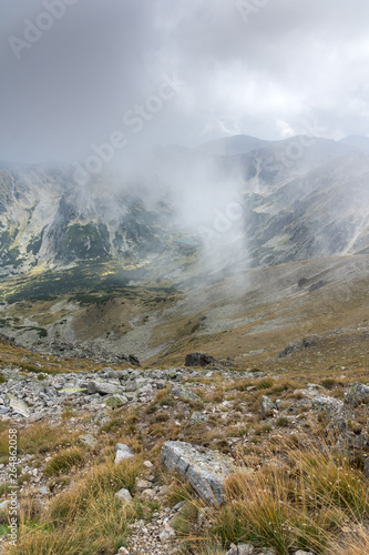 Amazing Panoramic view of hills covered with fog from Musala peak, Rila mountain, Bulgaria