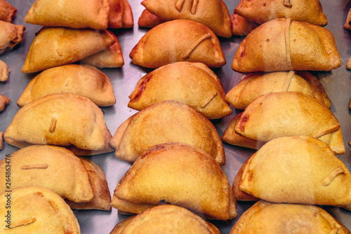 Traditional empanadillas pasty in small bar in Madrid, capital city of Spain