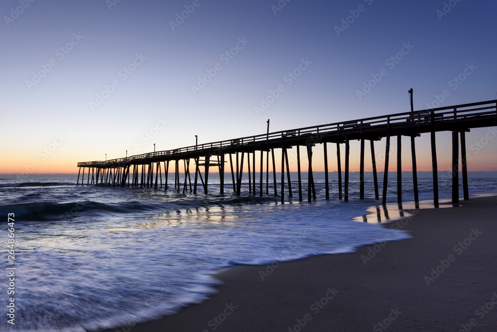 Ocean Pier at Dawn with Blue Sky