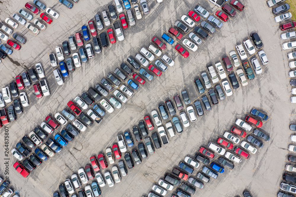 Aerial overhead shot of cars in a parking lot