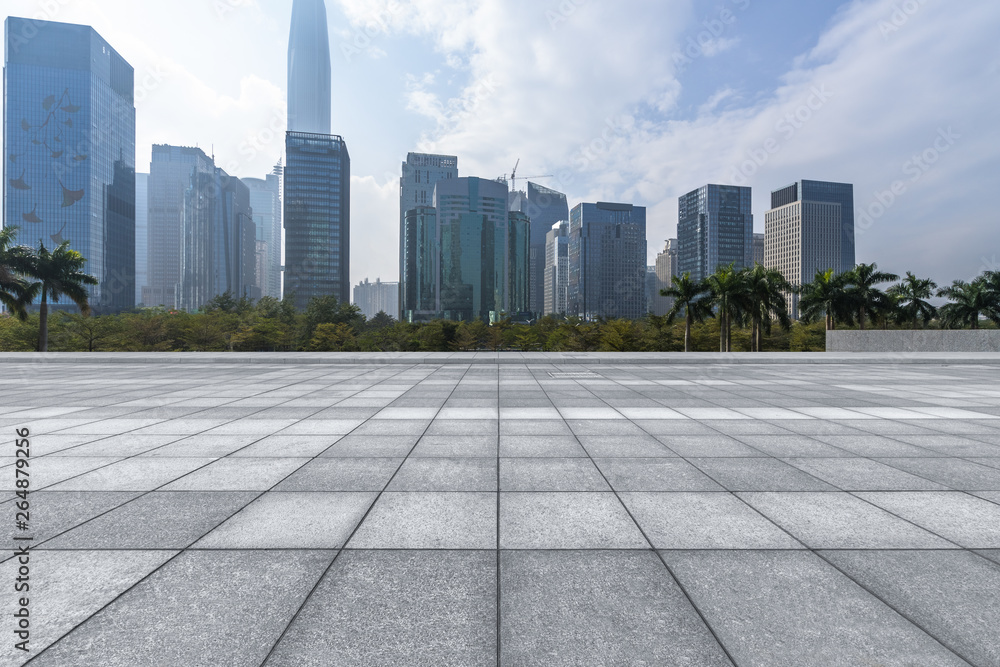 Panoramic skyline and buildings with empty square floor.