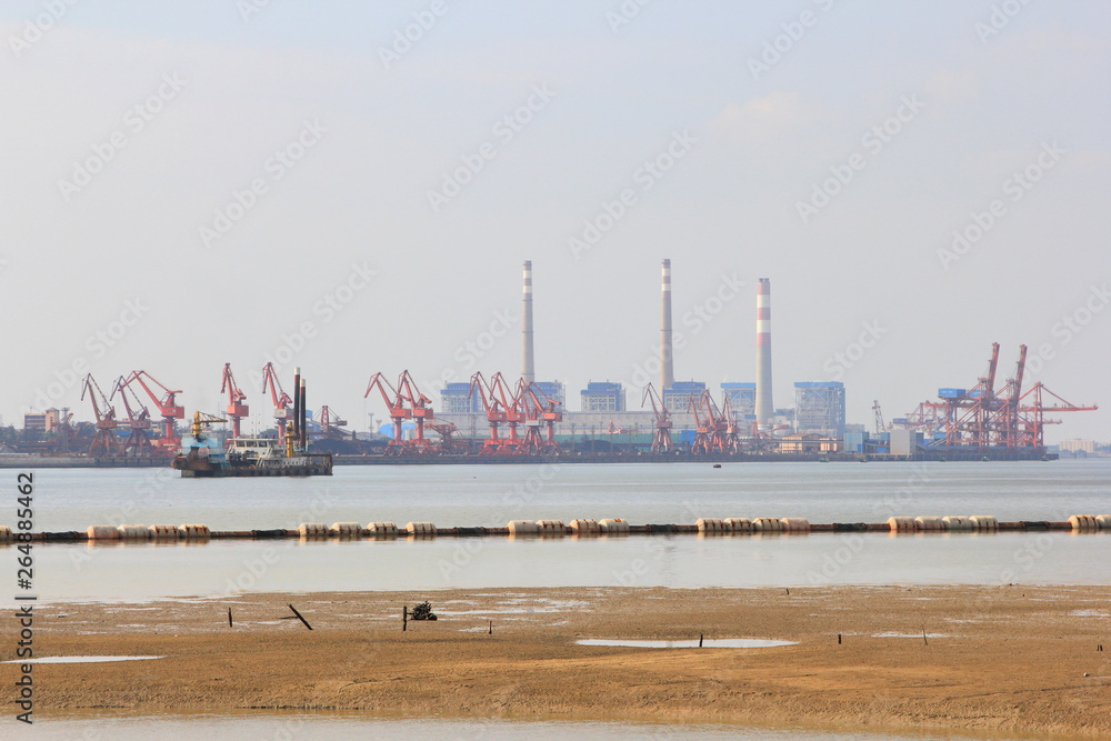 Port terminals and coal-fired power plants in the sea
