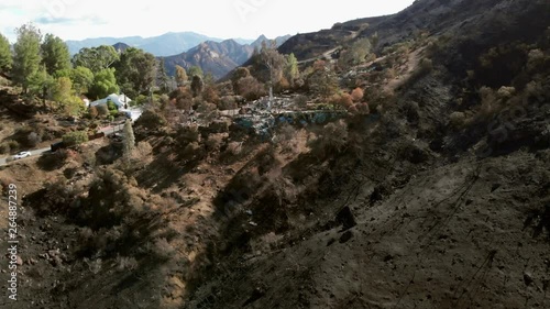 Aerial view of a burned house after the California Woosley wildfire