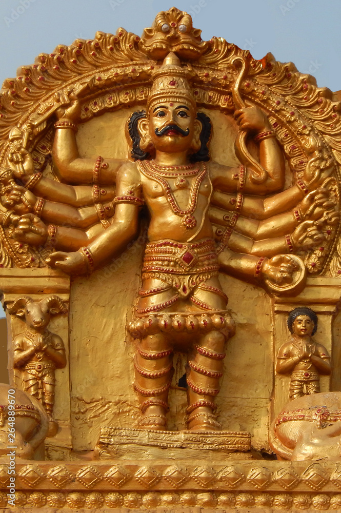 View of Indian god Vishnu in avatars holding weapons to end evil as in mythology