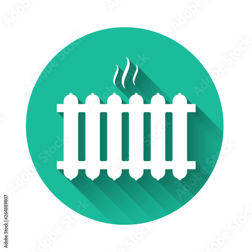 White Heating radiator icon isolated with long shadow. Green circle button. Vector Illustration