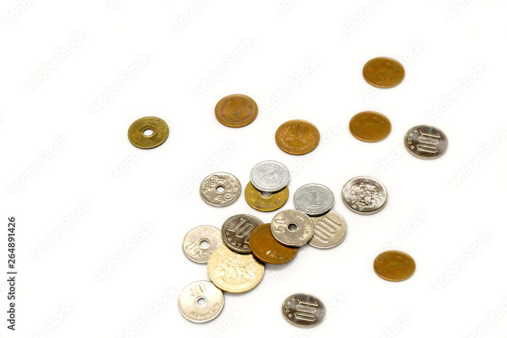 Japan yen currency coins spread from stack with copy space isolate on white background. Japan yen currency coins spread from stack with copy space isolate on white background.