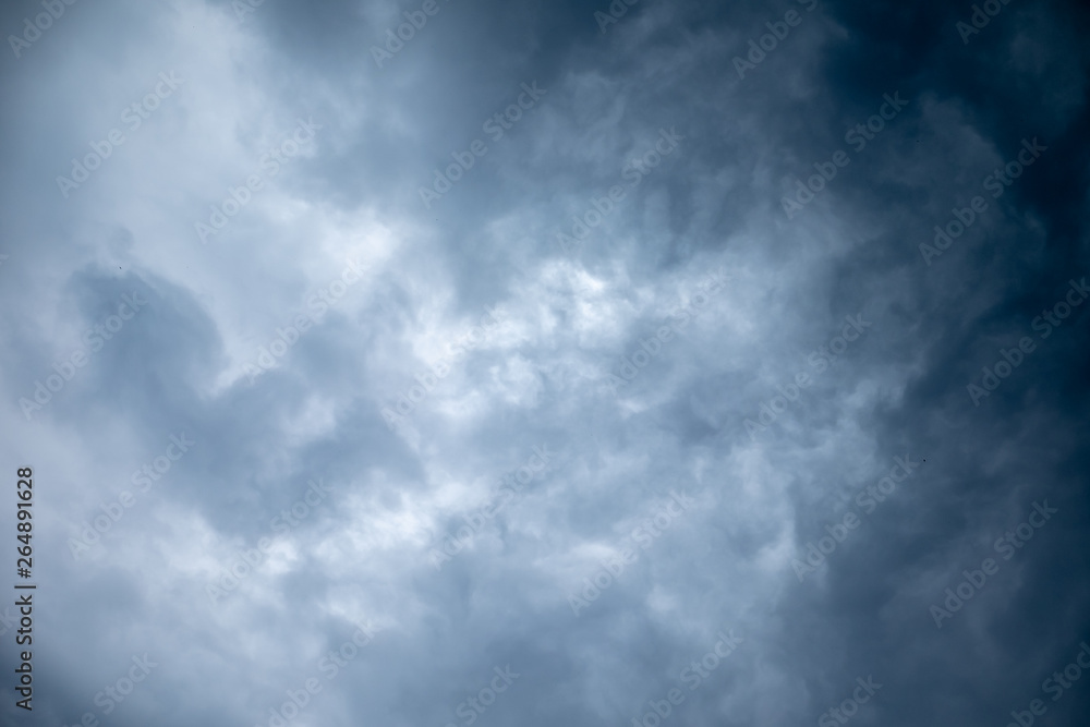 Light in the Dark and Dramatic Storm Clouds background Light in the Dark and Dramatic Storm Clouds background