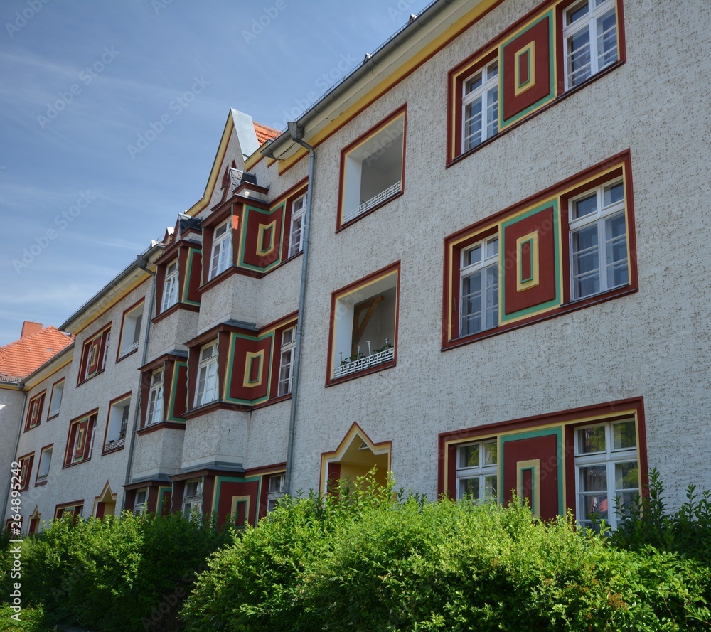 Naklejka premium Houses in the expressionist Style, architect Georg Heinrich Richard Ermisch (1885 – 1960) at Zeppelin Street (Zeppelinstraße) in Berlin Spandau from June 15, 2017, Germany