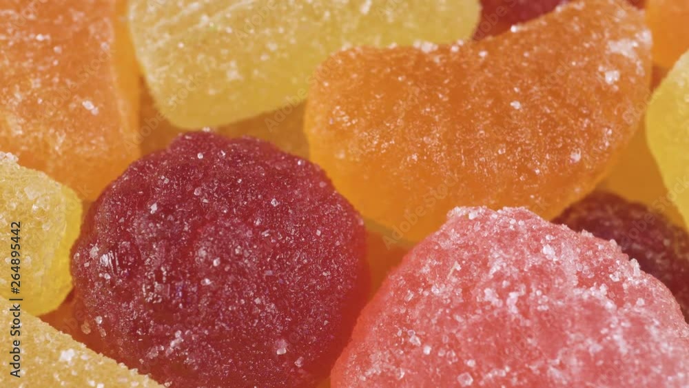 Beautiful colored candy, a festive dessert. video shooting with zoom and spin Beautiful colored candy, a festive dessert. video shooting with zoom and spin