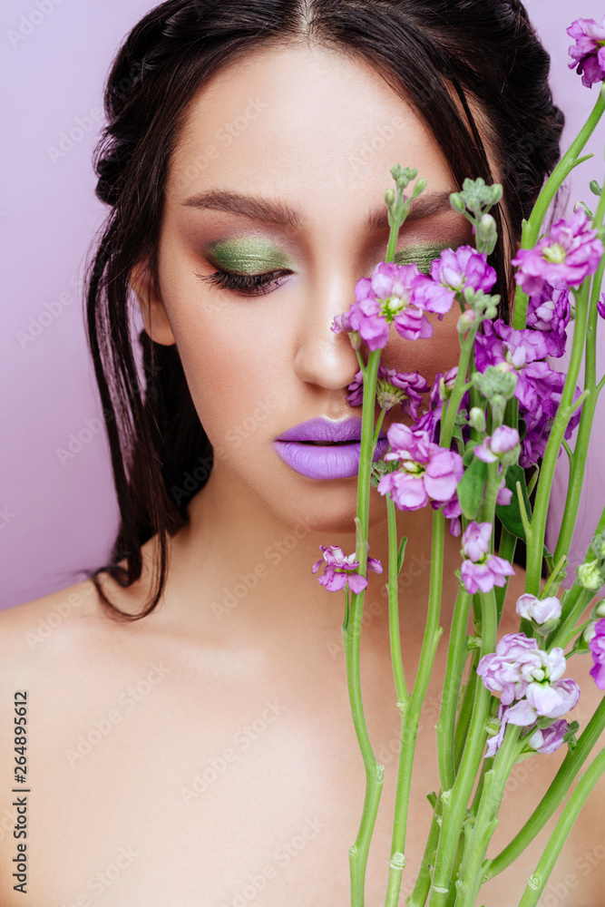 Beauty woman with floral crown magenta orchid flowers