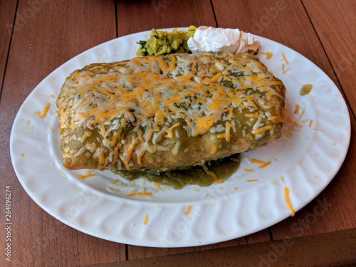 Wet Chimichanga/Fried Burrito with Guacamole and Sour Cream