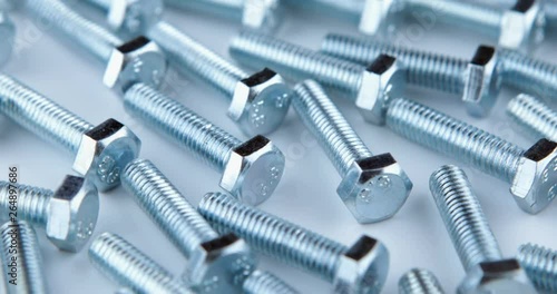 Stack of shiny nuts rotating on a white background