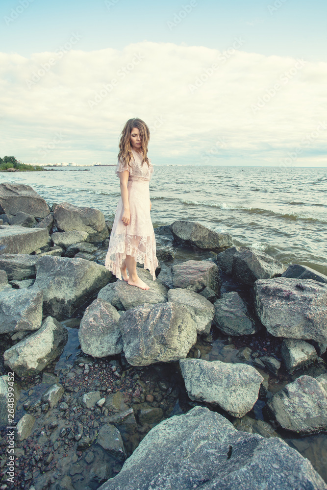 Stylish woman in beige dress outdoors Stylish woman in beige dress outdoors