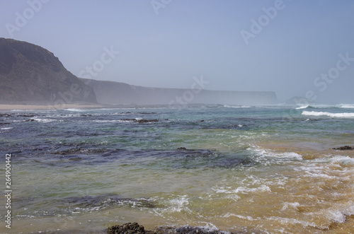 Cliffs on Praia da Fateixa. Arrifana Atlantic sea coast in Algarve, the south of Portugal.