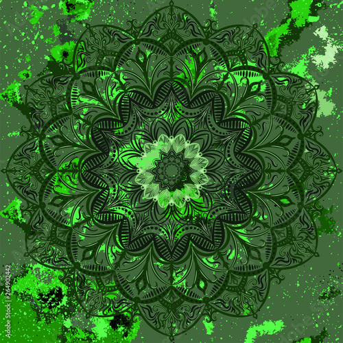 Mandala - a round lace pattern on the background with artifacts in malachite shades. Symmetrical geometric with elemental flora, a symbol of harmony and wealth. Design element.