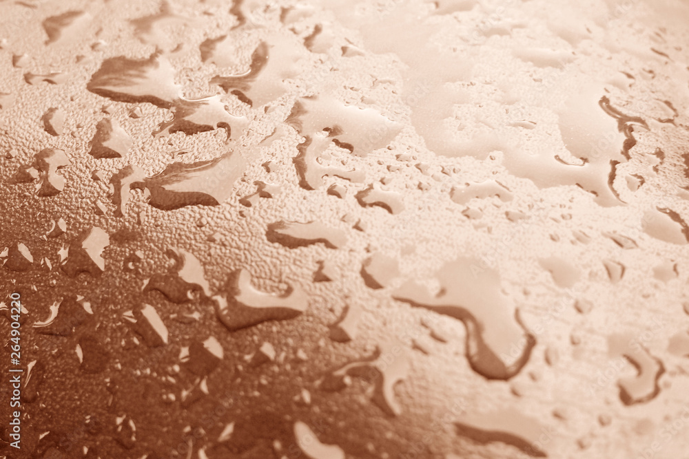 Water droplets texture on brown background Water droplets texture on brown background