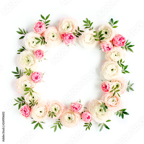 Floral pattern frame made of pink ranunculus and roses flower buds on white background.  Flat lay, top view floral background.