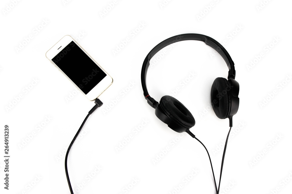 Black studio headphone and Smart phone isolated on white background. Black studio headphone and Smart phone isolated on white background.
