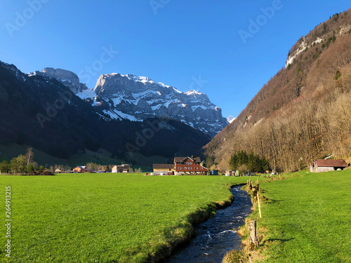 Alpine stream Schwendebach in the Appenzellerland region and under the slopes of Alpstein mountain range - Canton of Appenzell Innerrhoden (AI), Switzerland photo