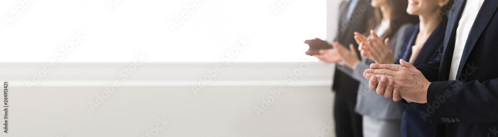 © Prostock-studio - Business group applauding