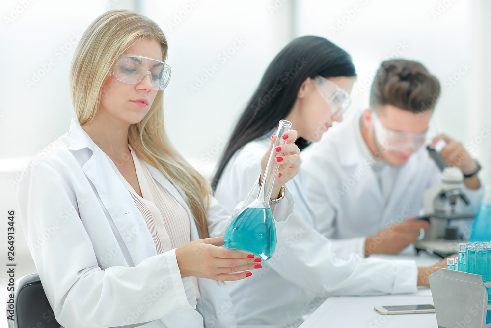 group of scientists conduct research in the laboratory group of scientists conduct research in the laboratory