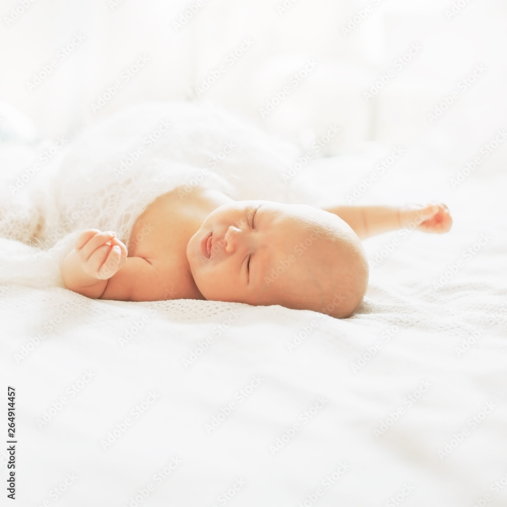 cute newborn baby is sleeping in the nursery. cute newborn baby is sleeping in the nursery.
