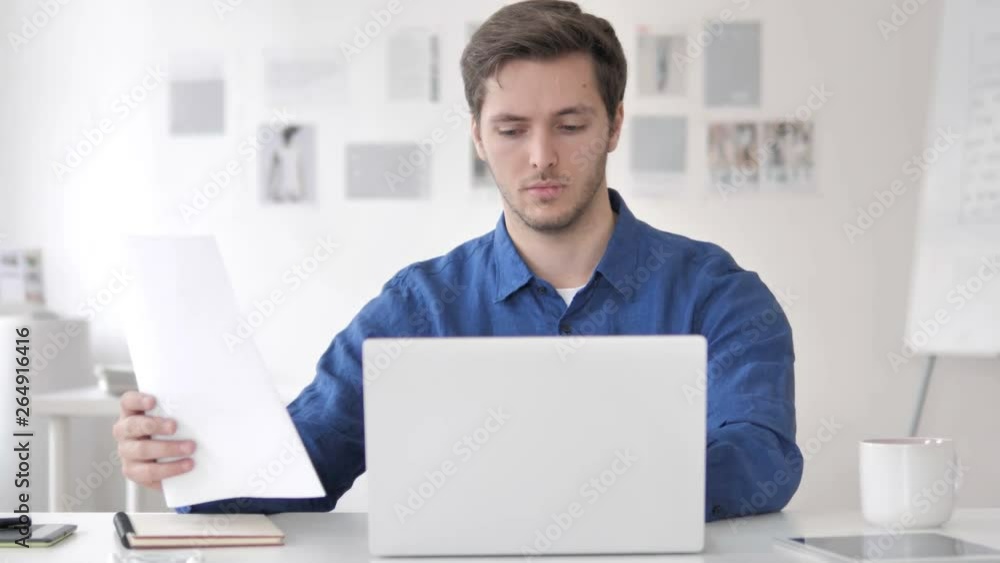 Casual Adult Man Working on Contract, Paperwork Casual Adult Man Working on Contract, Paperwork