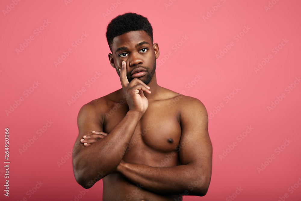 Thoughtful guy touching chin with finger, thinking or considering, making decision,imagining. close up photo. copy space. man having problems, trying to solve them Thoughtful guy touching chin with finger, thinking or considering, making decision,imagining. close up photo. copy space. man having problems, trying to solve them