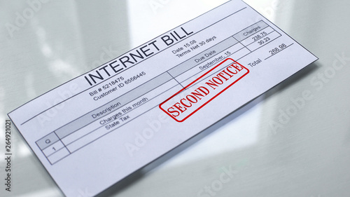 Internet bill second notice, seal stamped on document, payment for services