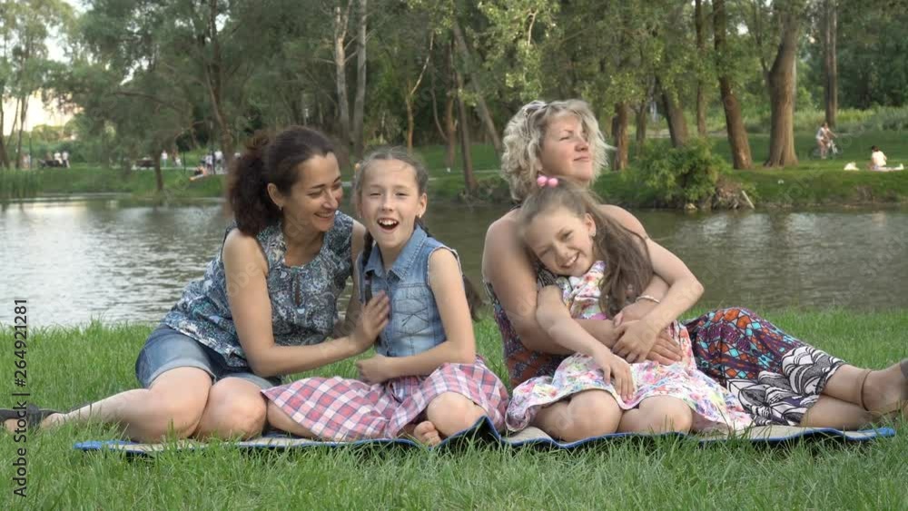 Wideo Stock: Same-sex family with children playing and ...