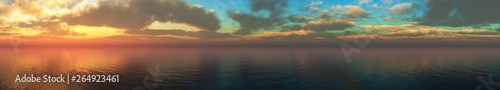 beautiful panorama of the sea sunset, the sun among the clouds above the ocean surface,