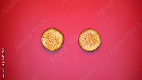 Grilled bun on bright background, burger ingredients, fresh bakery, barbeque