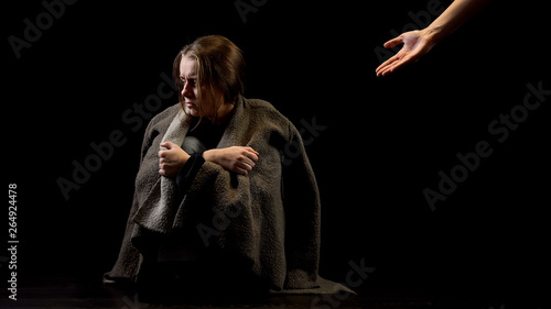 Slika na platnu Hand offering help to miserable woman, support of domestic violence victim