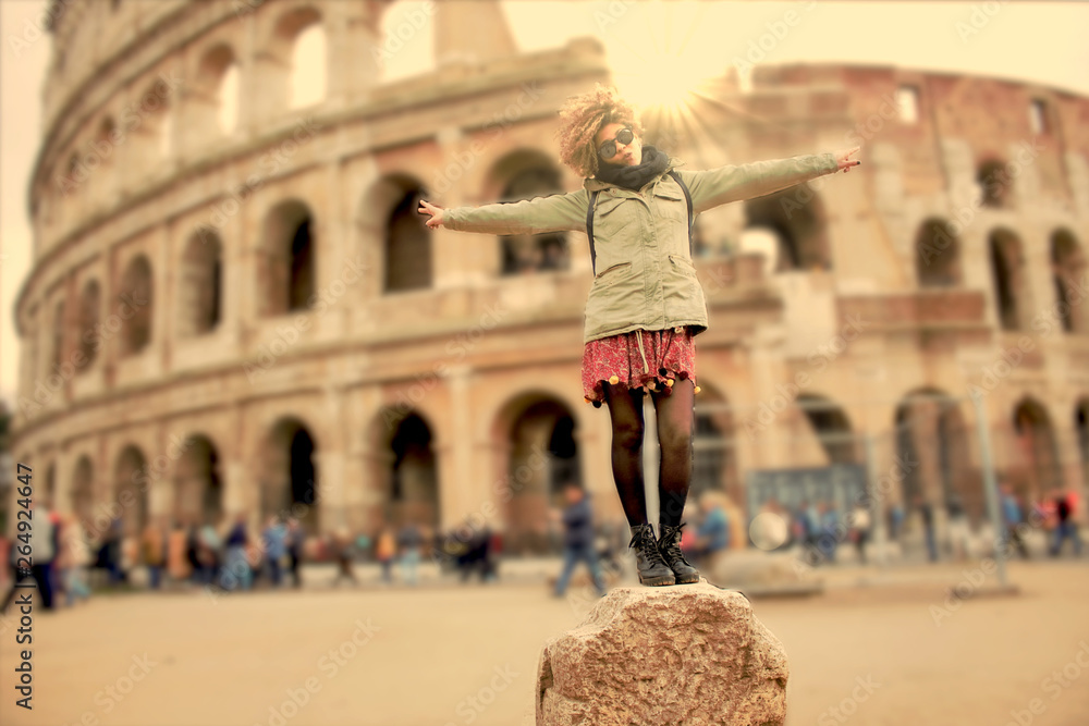 Afro American woman posing up a stone for a photo shoot at the Colosseum 