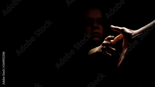 Forced prostitution victim taking helping hand unwilling suffer any more concept photo