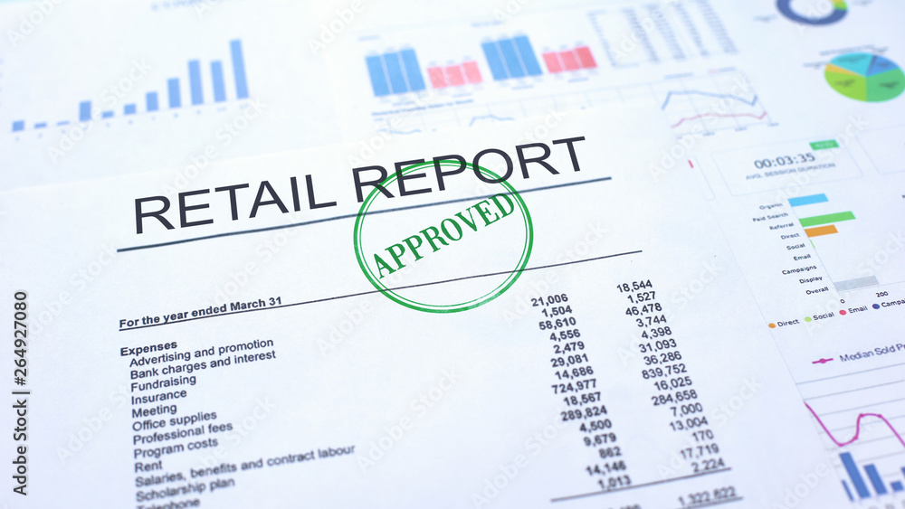Retail report approved, hand stamping seal on official document, statistics Retail report approved, hand stamping seal on official document, statistics